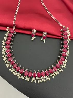 Trendy Silver Plated Ruby Stone Studded Necklace With Earrings Set